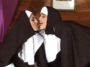 Three lustful lesbo nuns caress each other in cell